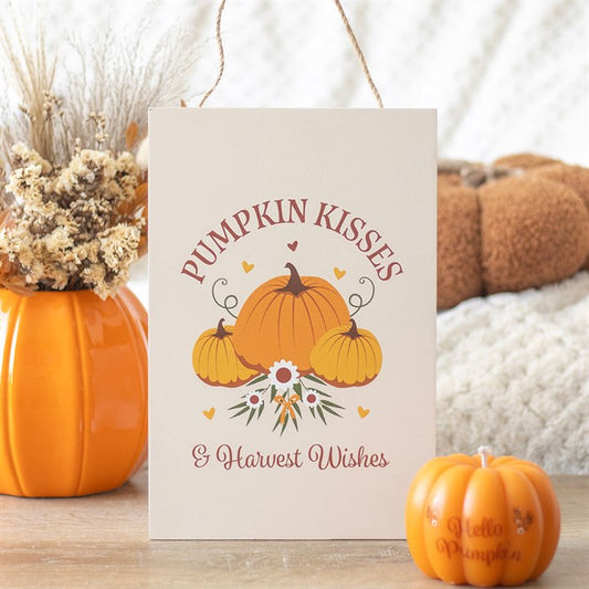 Card with 'Pumpkin Kisses & Harvest Wishes' text and pumpkins, surrounded by decorative pumpkins and flowers.